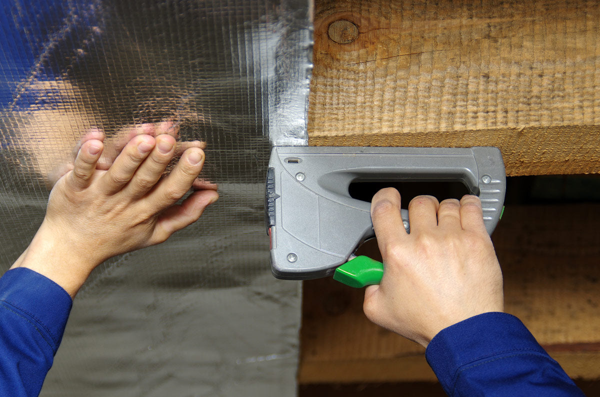 Installing radiant barrier under joists