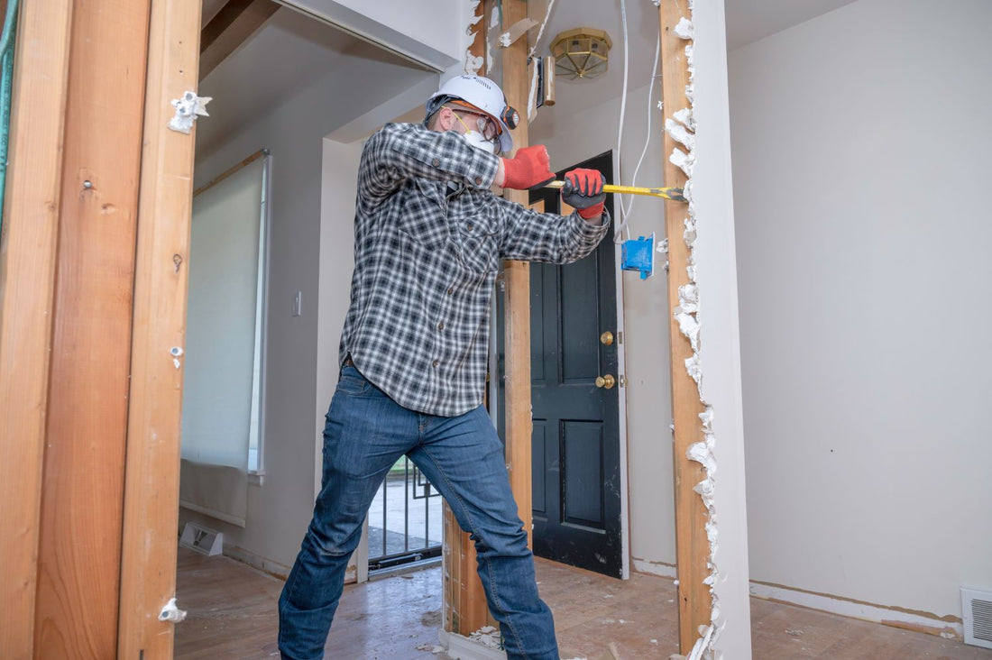 home remodeling contractor ripping out dry wall