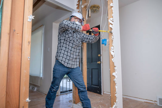 home remodeling contractor ripping out dry wall